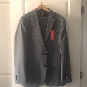 New Men’s The Seville Row Company Suit size 40L with size 34 wide pants.